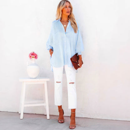 Mellanlång skjorta med randigt slag och oversized ärmar med stängning