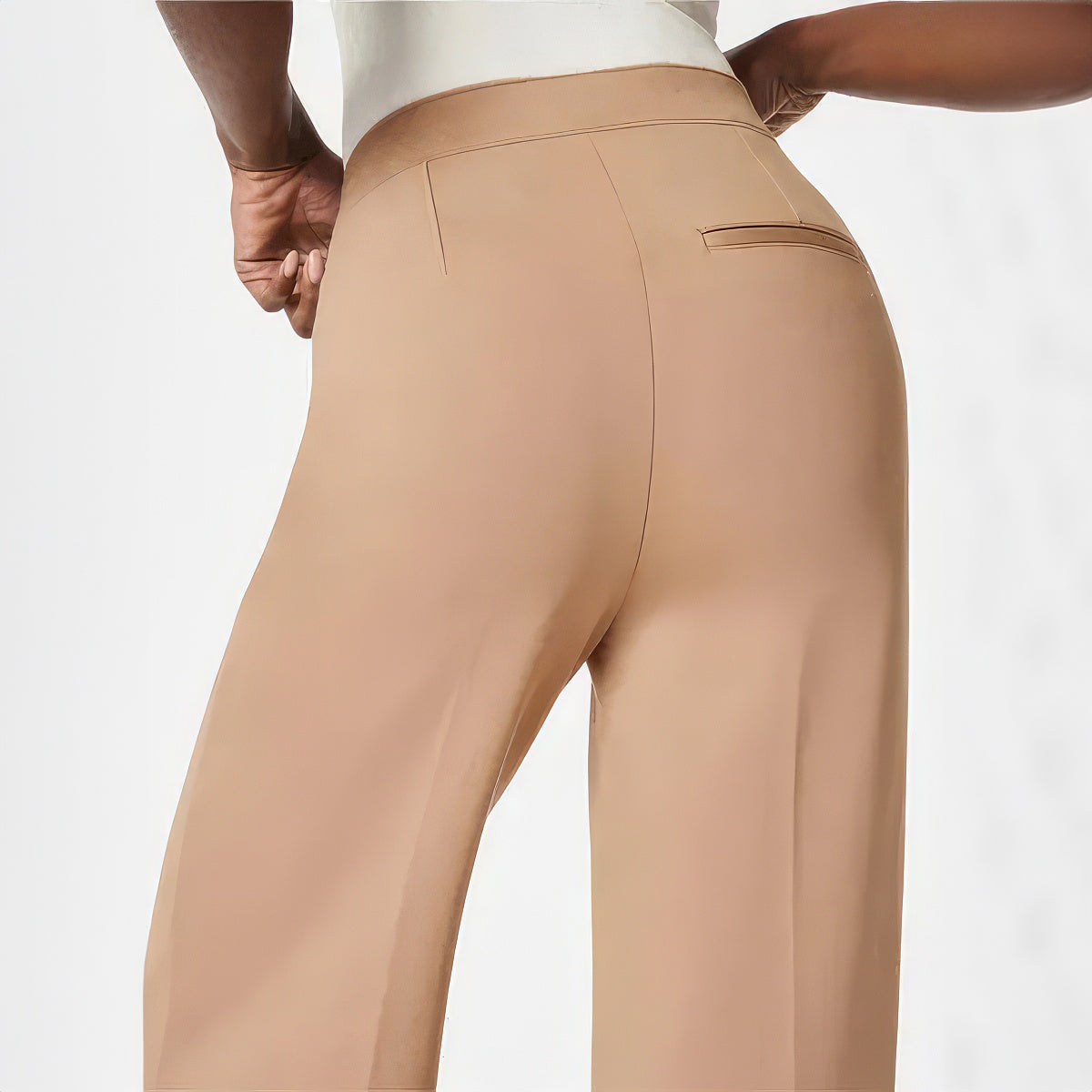 Byxor med vida ben med knapp för mage