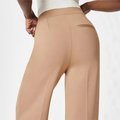 Byxor med vida ben med knapp för mage