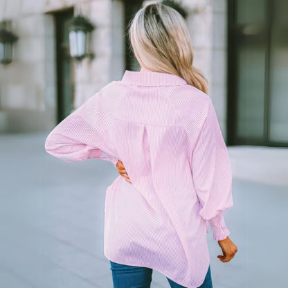 Mellanlång skjorta med randigt slag och oversized ärmar med stängning